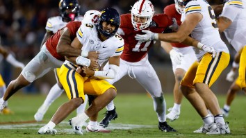 Cal QB Forcibly Restrained After Midfield Scuffle Follows Tense Axe Transfer